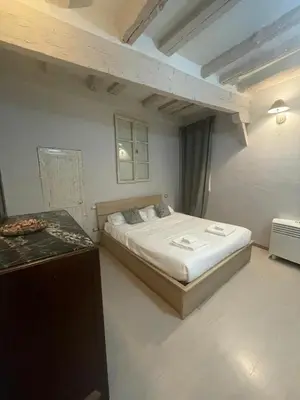 Letto o letti in una camera di Sweet house near piazza della signoria