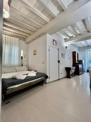 Letto o letti in una camera di Sweet house near piazza della signoria