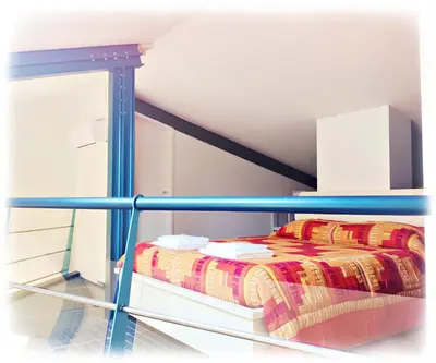 Letto o letti in una camera di MAISON LE PANCHE - Careggi - loft, parcheggio, tram