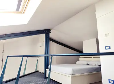 Letto o letti in una camera di MAISON LE PANCHE - Careggi - loft, parcheggio, tram