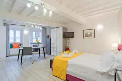 Letto o letti in una camera di Duomo studio