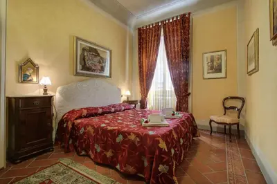 Letto o letti in una camera di Pergola Apartment