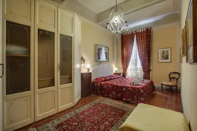 Letto o letti in una camera di Pergola Apartment