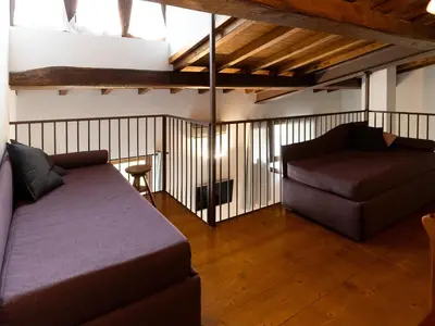 Letto o letti in una camera di I Fragoli al David Apartments Florence