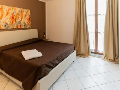 Letto o letti in una camera di I Fragoli al David Apartments Florence