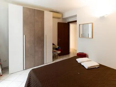 Letto o letti in una camera di I Fragoli al David Apartments Florence