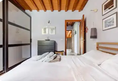Letto o letti in una camera di Casa Gelsomino