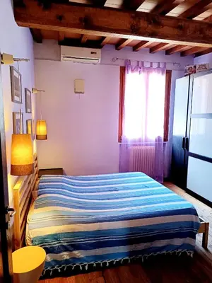 Letto o letti in una camera di Casa Gelsomino