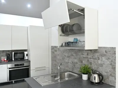 Cucina o angolo cottura di Boutique Apartment “Diviso Due”