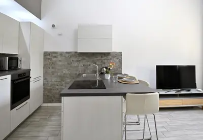 Cucina o angolo cottura di Boutique Apartment “Diviso Due”