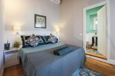 Letto o letti in una camera di Apartments Florence - Angel's Loft