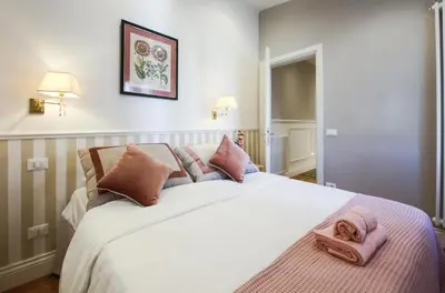 Letto o letti in una camera di Apartments Florence - Angel's Loft