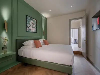 Letto o letti in una camera di Flora Deluxe Apartment