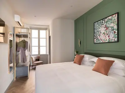 Letto o letti in una camera di Flora Deluxe Apartment
