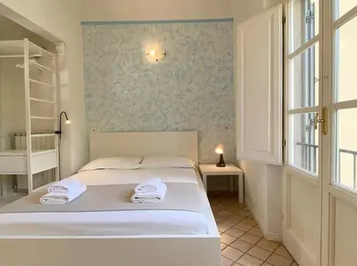 Letto o letti in una camera di Appartamento confortevole Santa Maria Novella