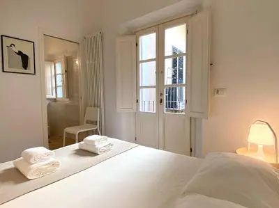 Letto o letti in una camera di Appartamento confortevole Santa Maria Novella
