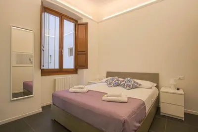 Letto o letti in una camera di Classy apartment in Mercato Centrale Firenze