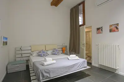 Letto o letti in una camera di Classy apartment in Mercato Centrale Firenze