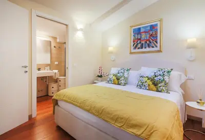 Letto o letti in una camera di Garden House by Canto degli Aranci