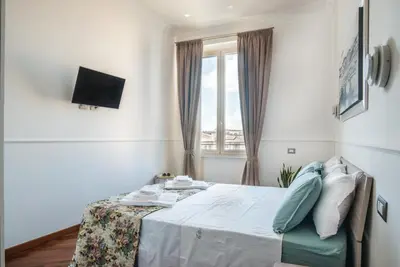 Letto o letti in una camera di Your Home in Florence next to the central train station