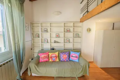 Area soggiorno di Pretty Apartment Alfani
