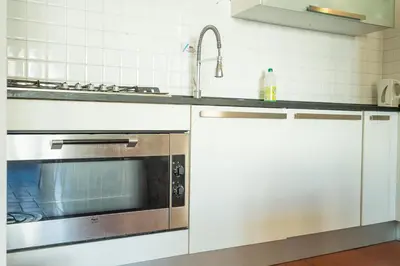 Cucina o angolo cottura di Cozy Apartment With A Strategic Position