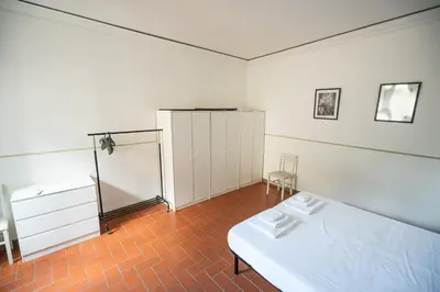Letto o letti in una camera di Cozy Apartment With A Strategic Position
