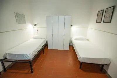 Letto o letti in una camera di Cozy Apartment With A Strategic Position