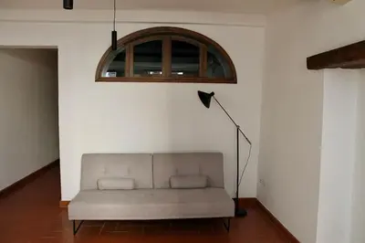 Area soggiorno di Cute Apartment Near Santa Croce
