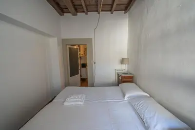 Letto o letti in una camera di Cozy & Quiet 2BR Outside ZTL & 10min from Center