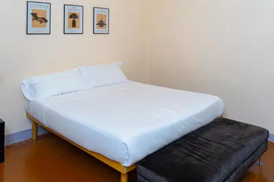 Letto o letti in una camera di Elegant Apartment Near Piazza Della Signoria