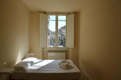 Letto o letti in una camera di Modern 3BR Near Santa Maria Novella Station