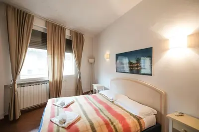 Letto o letti in una camera di Nice Apartment Near Ponte Vecchio