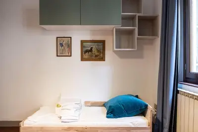 Letto o letti in una camera di Classic Florentine Flat Near Piazza Santa Croce