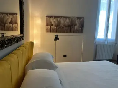Letto o letti in una camera di CasaLu