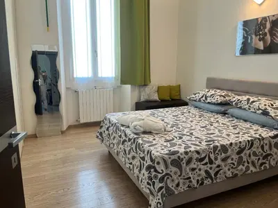 Letto o letti in una camera di CasaLu