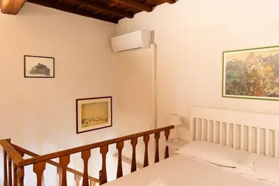 Letto o letti in una camera di Charming 1BR Apartment