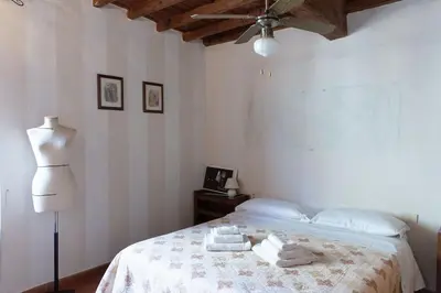 Letto o letti in una camera di Charming Apartment By Piazza Santo Spirito