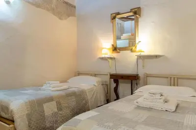 Letto o letti in una camera di Charming Apartment By Piazza Santo Spirito