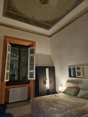 Letto o letti in una camera di Scuderie Il Magnifico