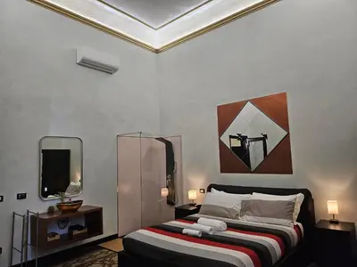 Letto o letti in una camera di Scuderie Il Magnifico