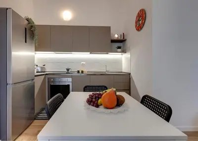 Cucina o angolo cottura di Guya Apartment by Mamo Florence