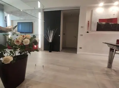TV o dispositivi per l'intrattenimento presso Appartamento incantevole con parcheggio gratuito