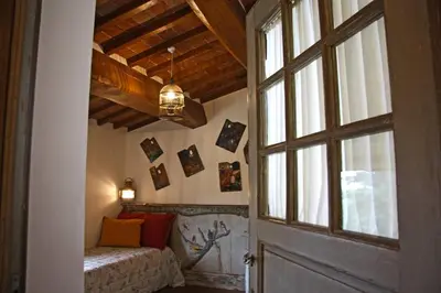 Letto o letti in una camera di AGRITURISMO VICOLABATE