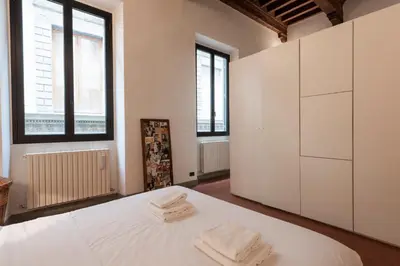 Letto o letti in una camera di Porta Rossa Modern by Mmega