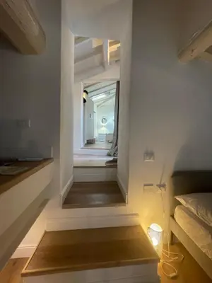 Letto o letti in una camera di Corte Santa Caterina in Florence