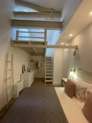 Letto o letti in una camera di Corte Santa Caterina in Florence