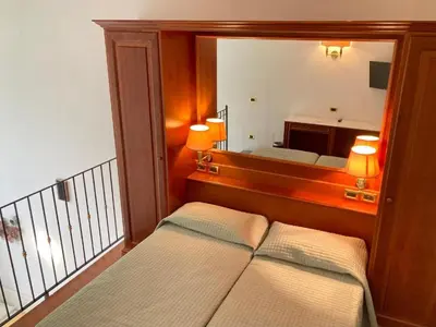 Letto o letti in una camera di Fantastic Garden - Firenze Nord