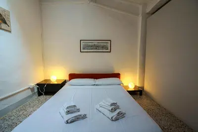 Letto o letti in una camera di Lovely & Charming 1BR- 7 min walk by the Duomo