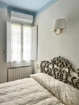 Letto o letti in una camera di Casa Paradiso